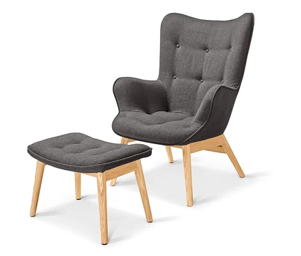 Fauteuil individuel gris foncé avec repose-pieds sur fond clair.
