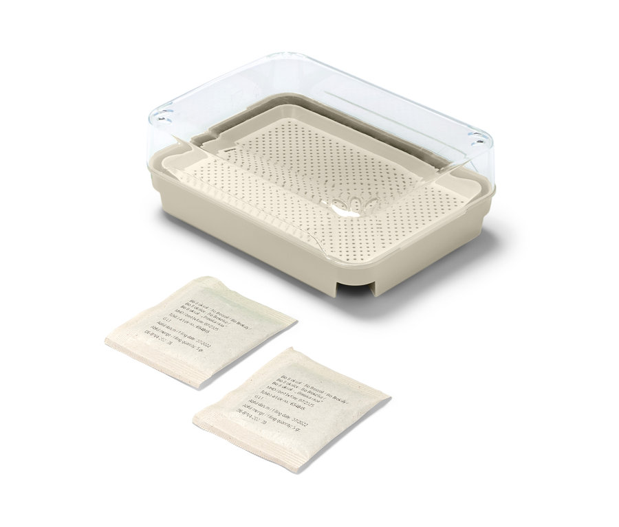 Set pour cultiver des micro-pousses avec couvercle transparent et deux sachets de graines.