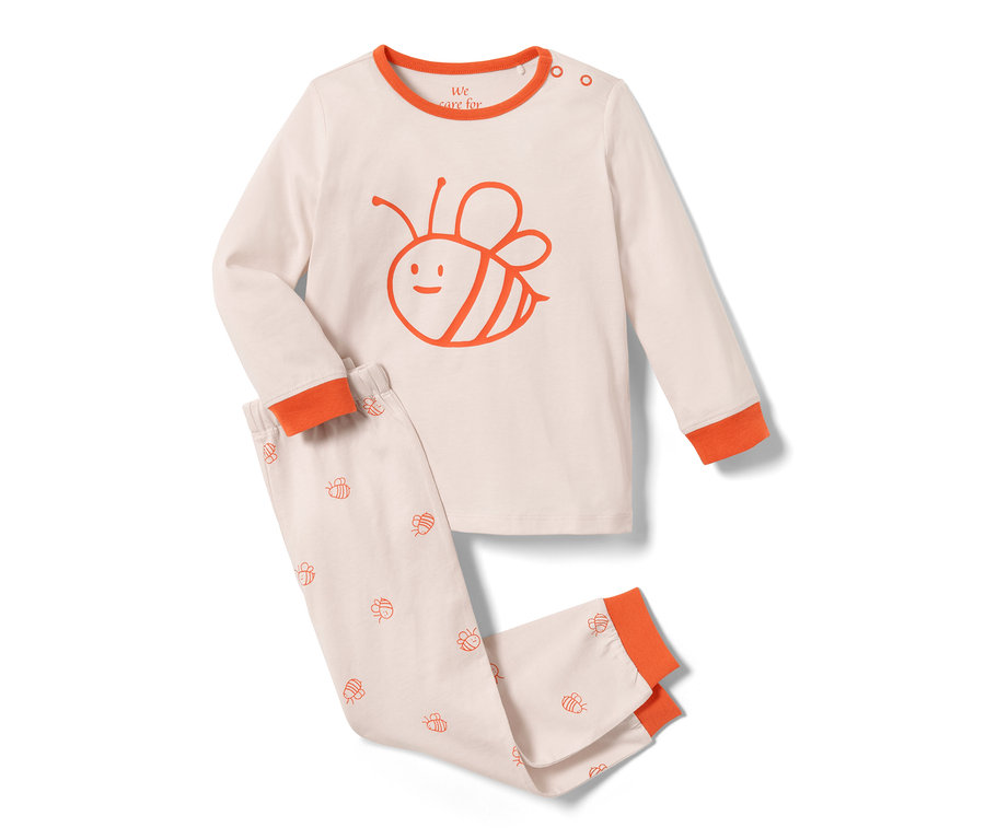 Un haut rose avec un imprimé d'abeille et un pantalon bleu avec un imprimé d'abeille, provenant de l'ensemble de 2 pyjamas pour tout-petits.