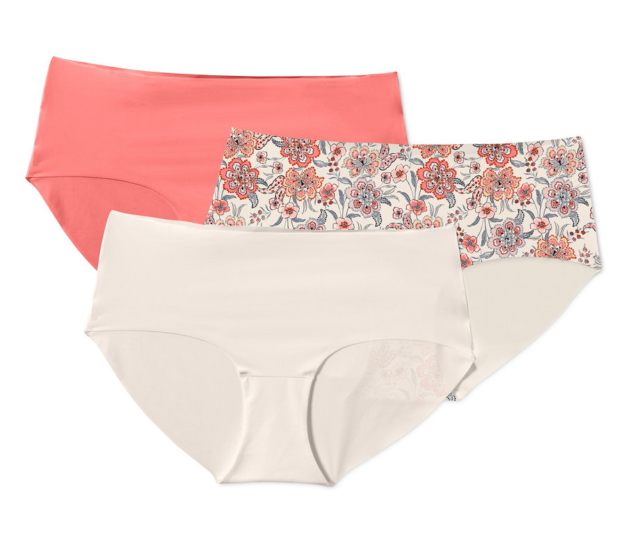 Trois culottes « Magic Cut » : corail, à fleurs et crème.