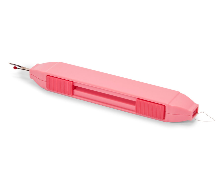 Un outil de couture 2-en-1 rose.