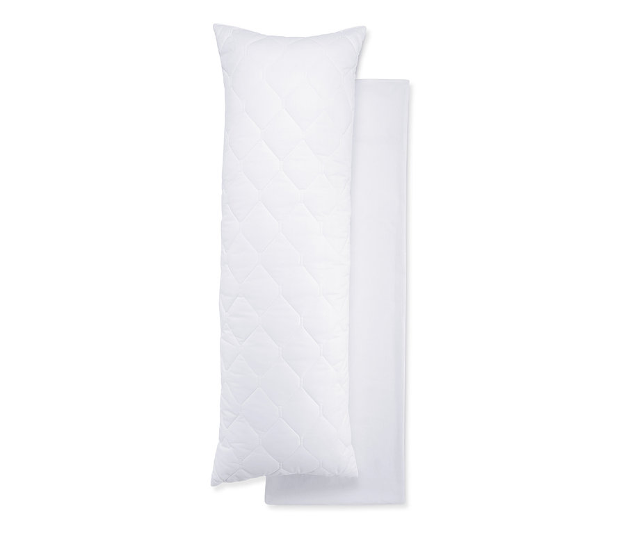 Deux coussins blancs pour dormir sur le côté, dont un matelassé.