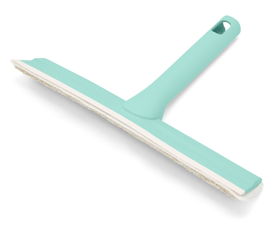 Une raclette de fenêtre turquoise avec une lèvre en caoutchouc blanche repose sur un fond blanc.