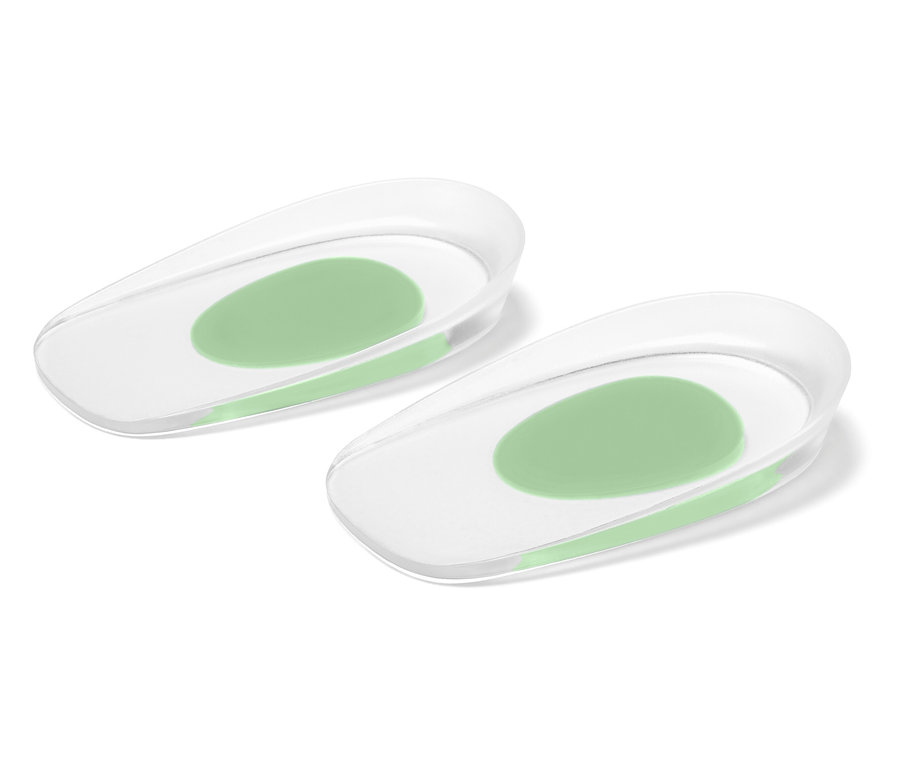 Deux talonnettes en gel transparent avec un insert en gel vert clair au centre.