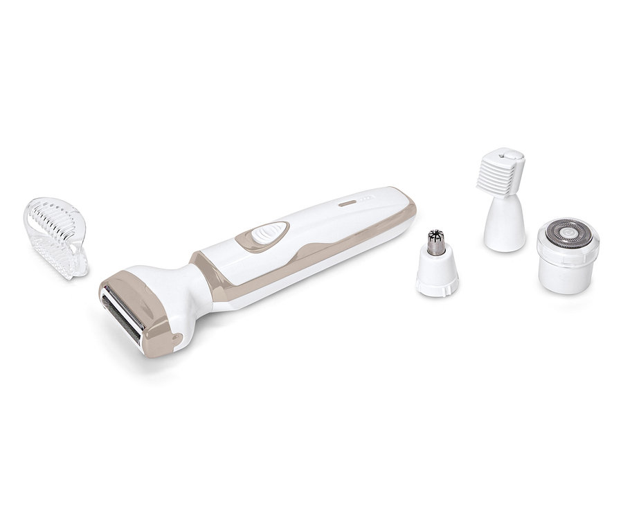 Une tondeuse à cheveux blanche et beige est posée avec différents accessoires sur un fond blanc.