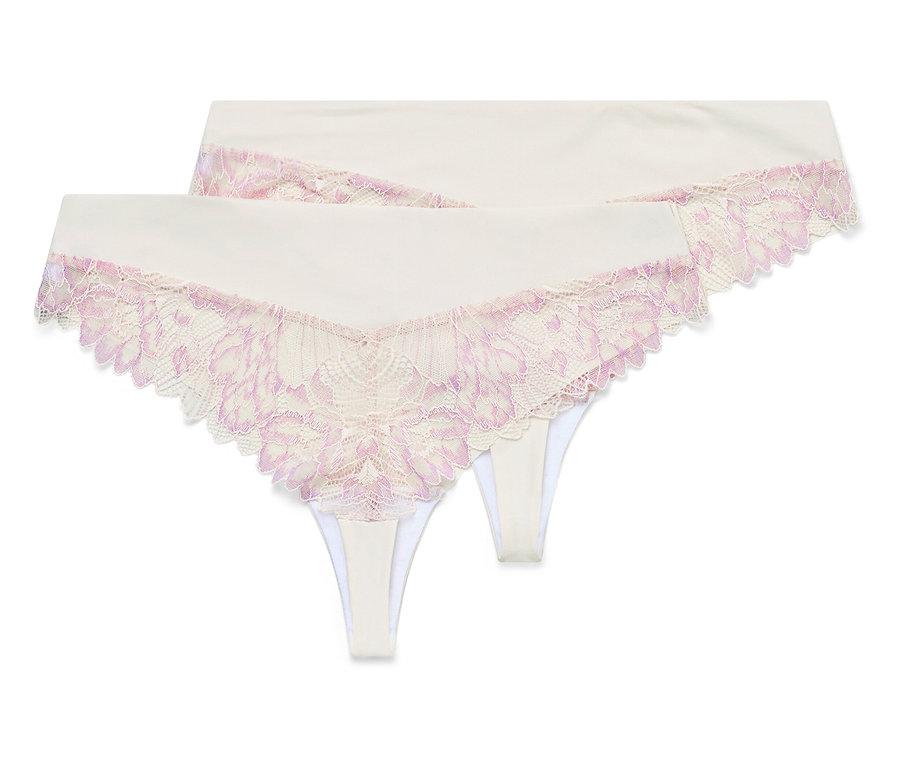 Deux strings blancs avec de la dentelle rose sont posés l'un sur l'autre.