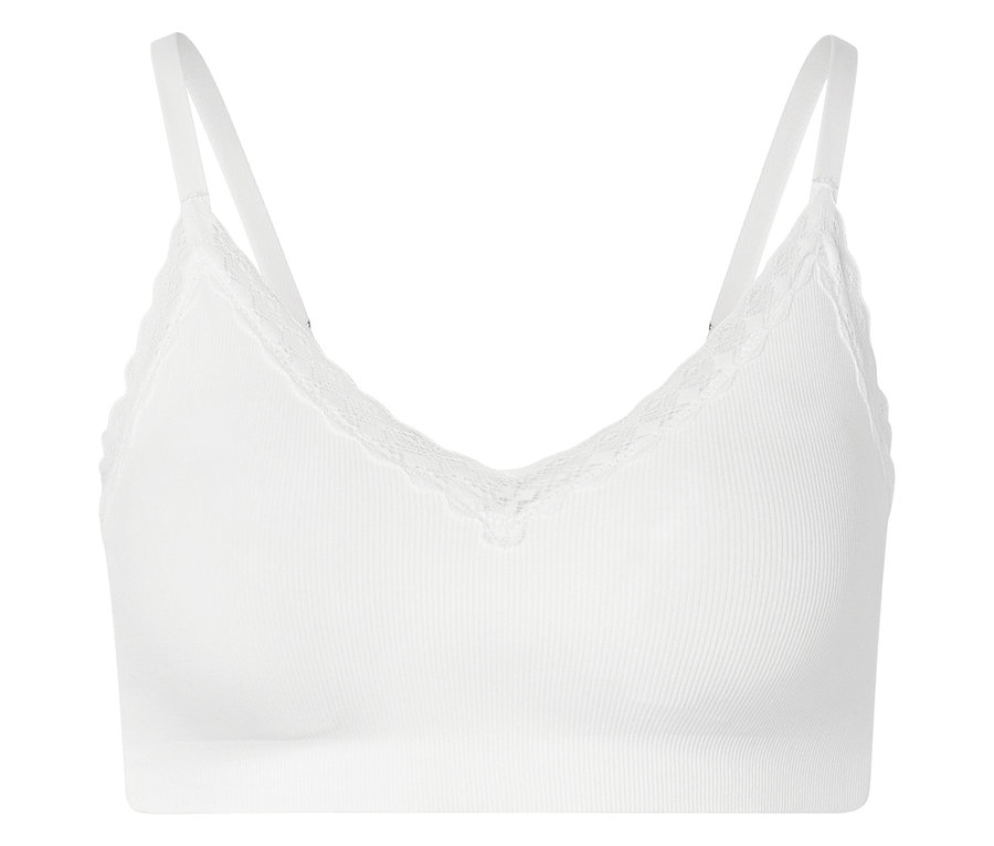 Bralette blanche côtelée avec dentelle et bretelles réglables sur fond blanc.