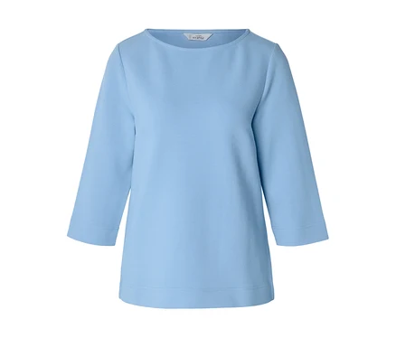 Haut bleu clair avec encolure bateau et manches 3/4.