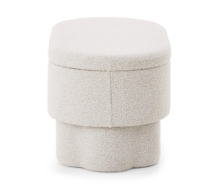 Un pouf cylindrique blanc texturé avec un design étagé.