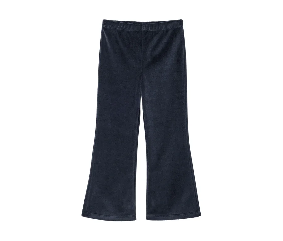 Pantalon évasé en velours bleu foncé sur fond blanc.