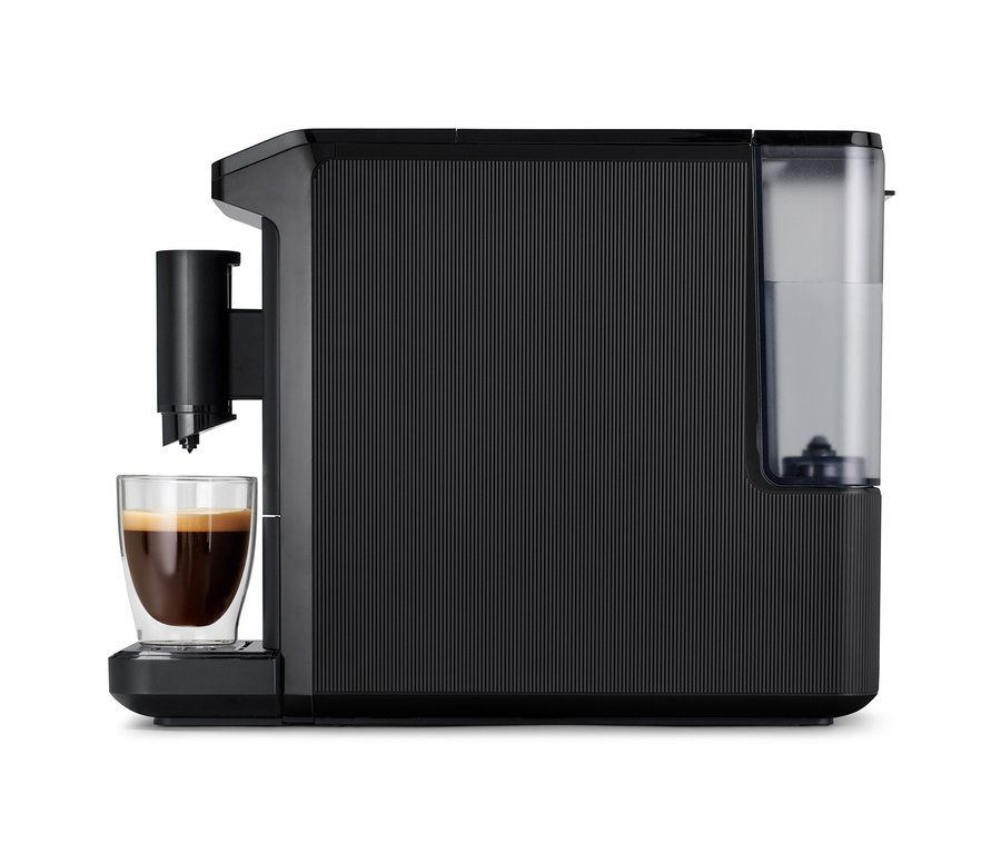 Gros plan sur une machine à café « Esperto mini » avec une tasse.