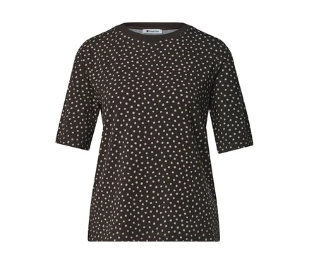 T-shirt marron foncé à pois blancs, manches courtes et col rond.