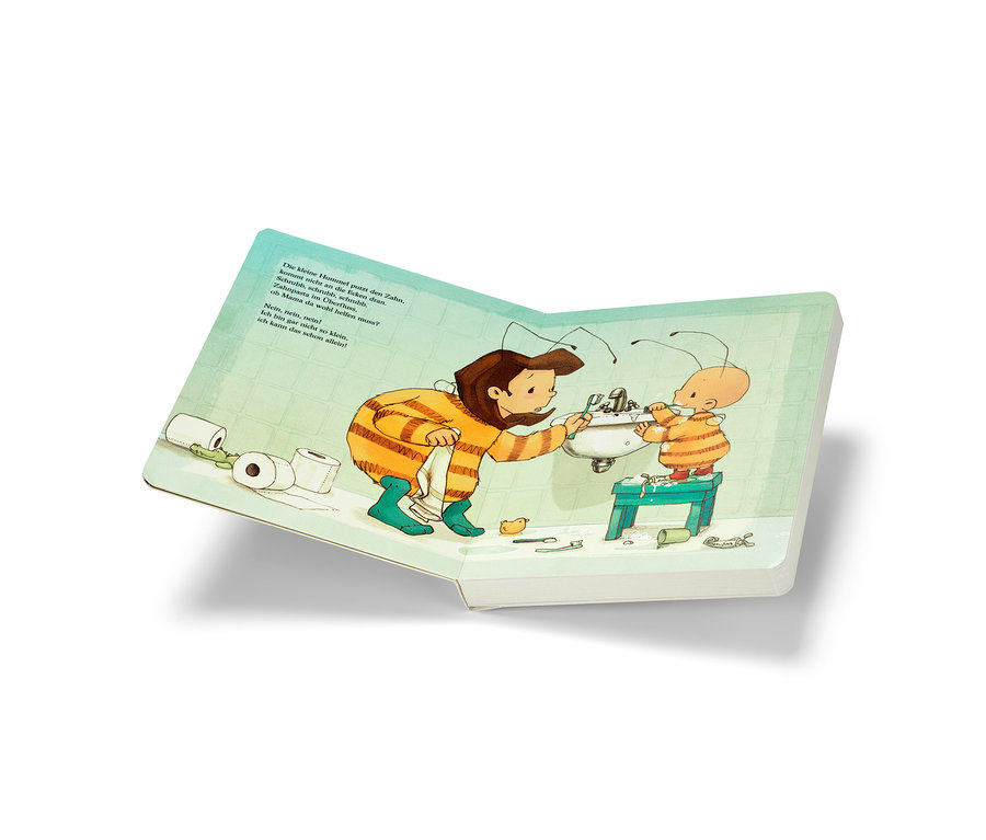 Illustration du livre « Baby Hummel Bommel – erste Geschichten » montrant une mère et un enfant se brossant les dents dans la salle de bain.