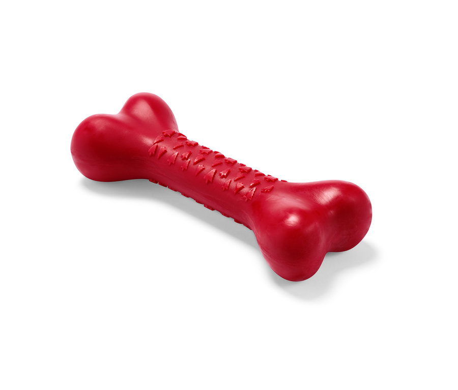 Un jouet pour chien rouge en forme d'os.