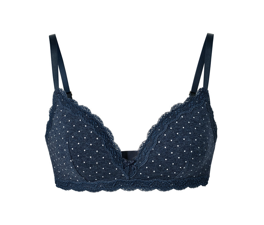 Soutien-gorge à coques souples bleu foncé à pois blancs bordé de dentelle.