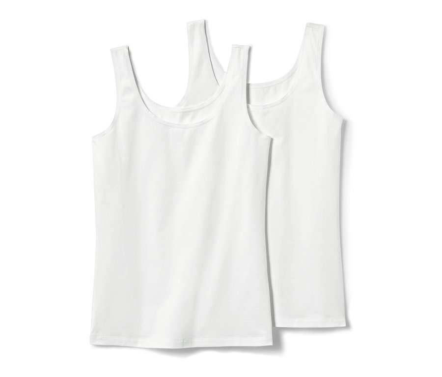 Deux caracos blancs, 2 pièces, sont posés l'un sur l'autre.