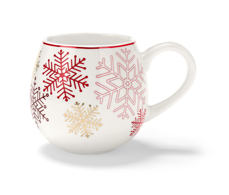 Une Tasse XL avec un bord rouge et des flocons de neige de différentes couleurs.
