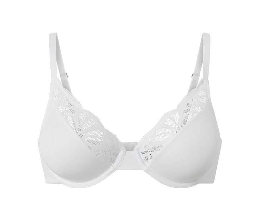 Gros plan d'un soutien-gorge à armatures blanc avec des détails en dentelle.
