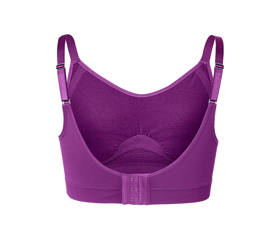 Gros plan sur le dos d'un soutien-gorge de sport Seamless rose baie avec fermeture à trois crochets.