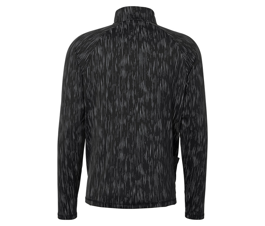 Détail d'une veste noire à motifs.