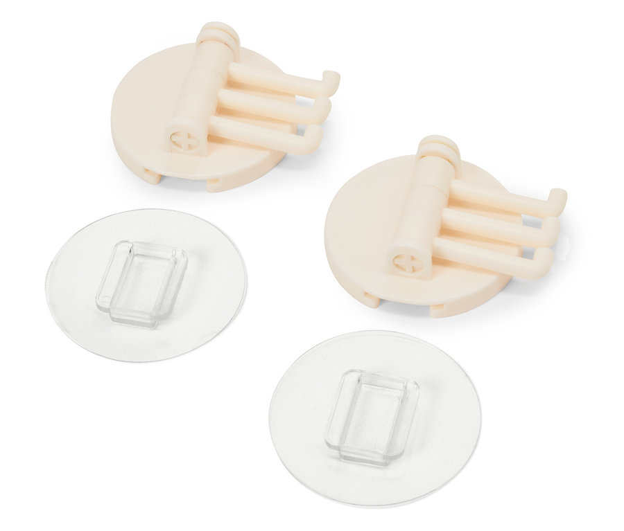 Deux supports beiges avec trois crochets chacun et des tampons adhésifs transparents.