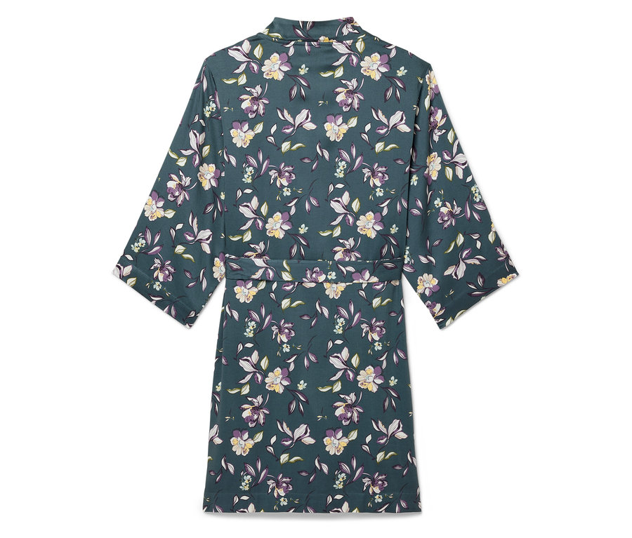 Vue arrière d'une robe de chambre à imprimé floral dans des tons de vert, violet et blanc.
