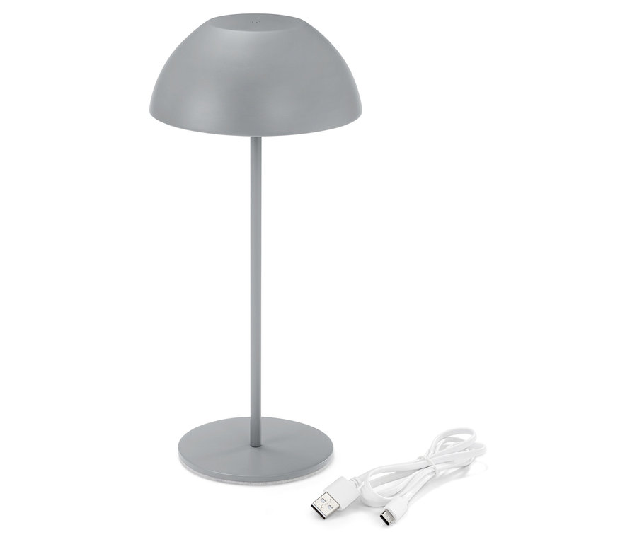Lampe grise avec câble USB sur fond blanc.