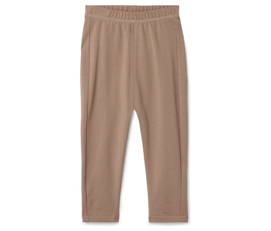 Pantalon beige avec élastique à la taille sur fond blanc.