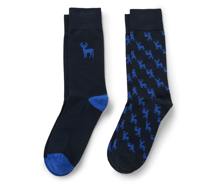 Deux paires de chaussettes bleu foncé. Une paire avec une image d'élan bleue et un bout et un talon bleus, l'autre avec un motif d'élan bleu sur toute la surface.