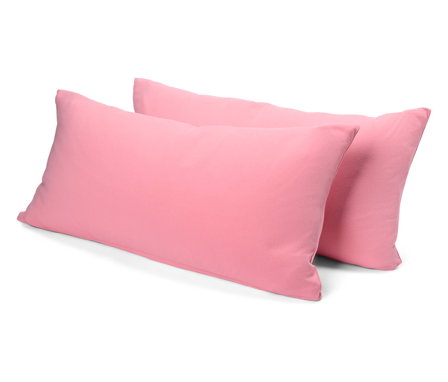 Deux oreillers roses superposés.