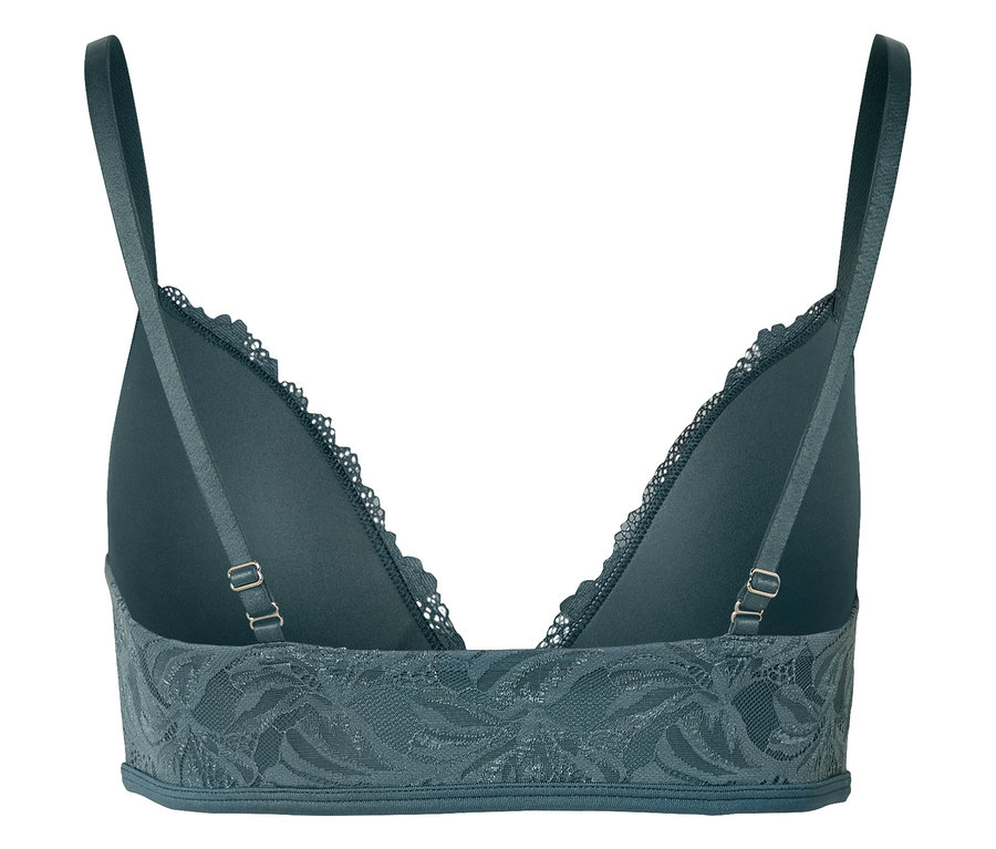 Gros plan du dos d'un soutien-gorge vert avec de la dentelle.