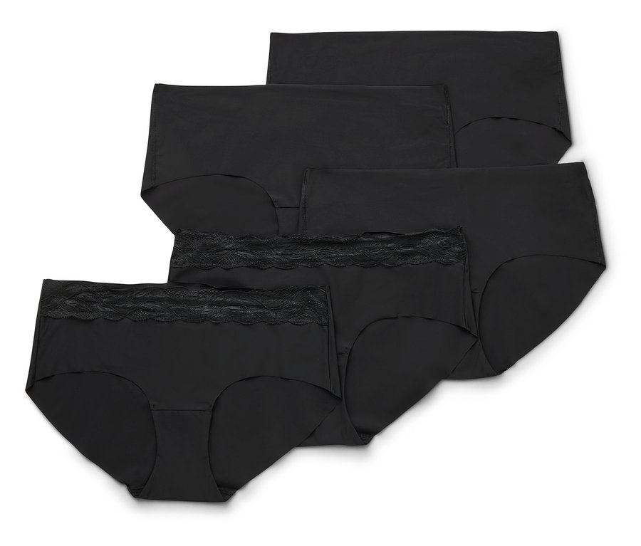 Cinq culottes Magic Cut noires, celle de devant avec une bordure en dentelle noire à la taille.