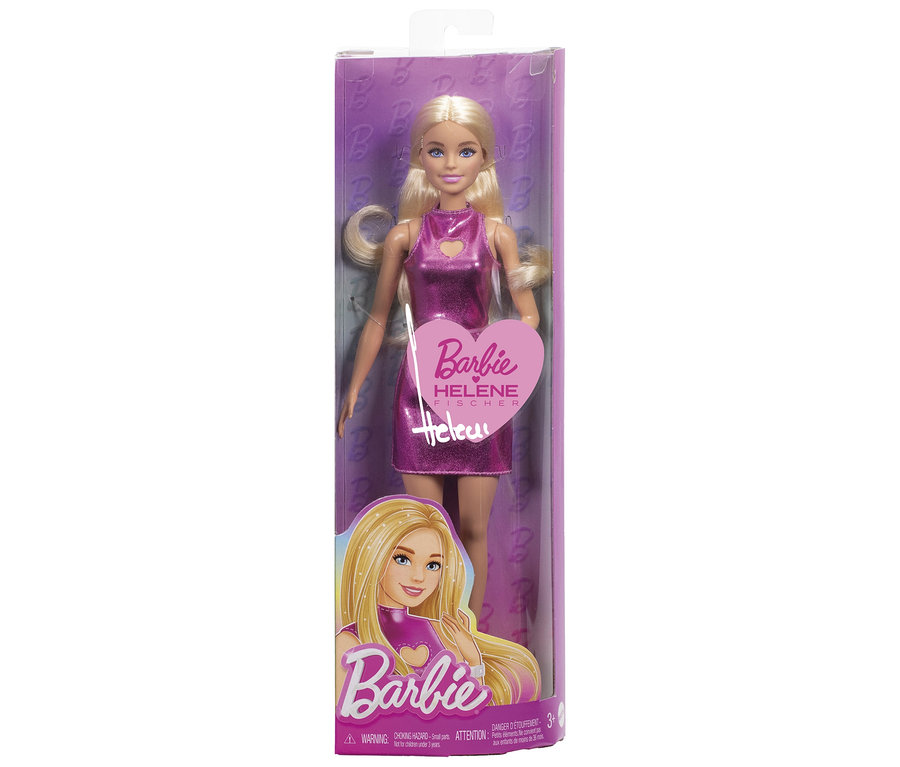 Poupée Barbie dans son emballage, avec des cheveux blonds et une robe rose brillante, la boîte indique "Barbie Helene Fischer".
