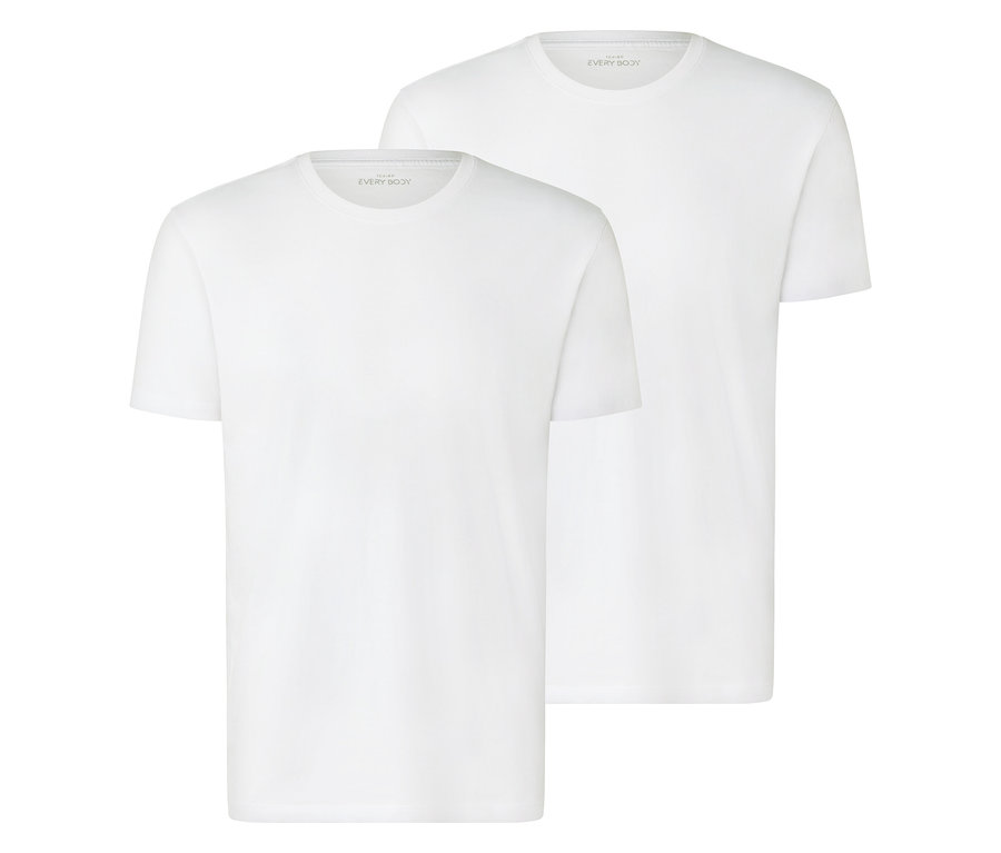 Deux t-shirts blancs sont superposés.