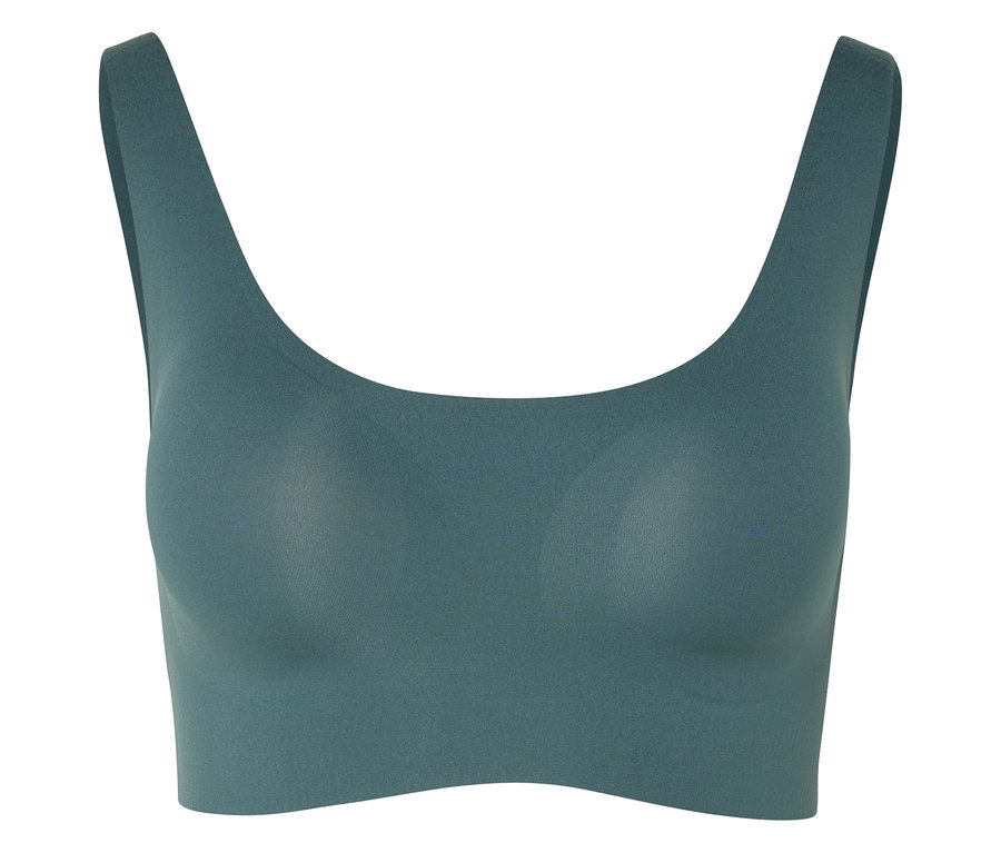 Un soutien-gorge de sport vert avec de larges bretelles.