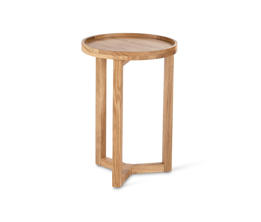 Table d'appoint ronde en bois clair sur fond blanc.