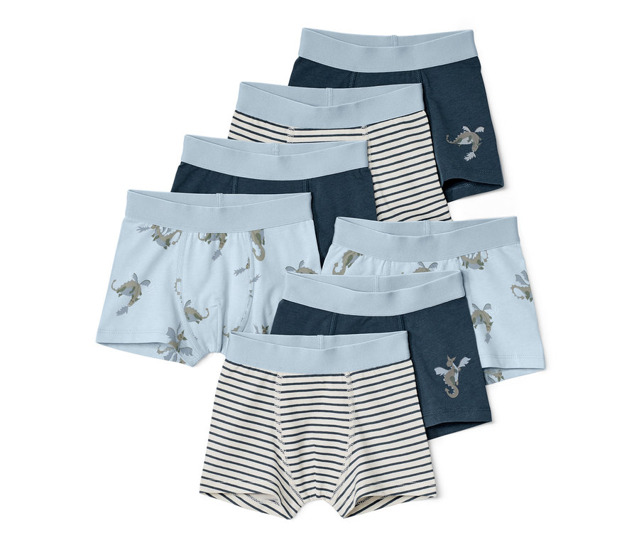 Sept boxers pour enfant avec différents motifs, dont des dragons et des rayures.