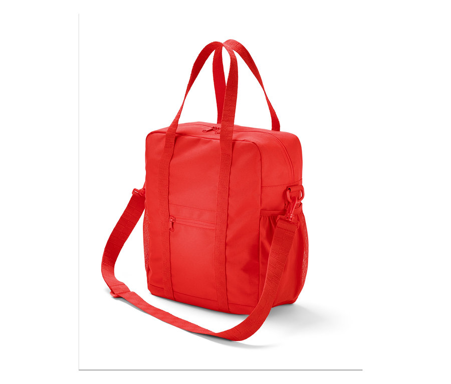 Sac à bandoulière rouge pour vélo avec poignées et bandoulière.