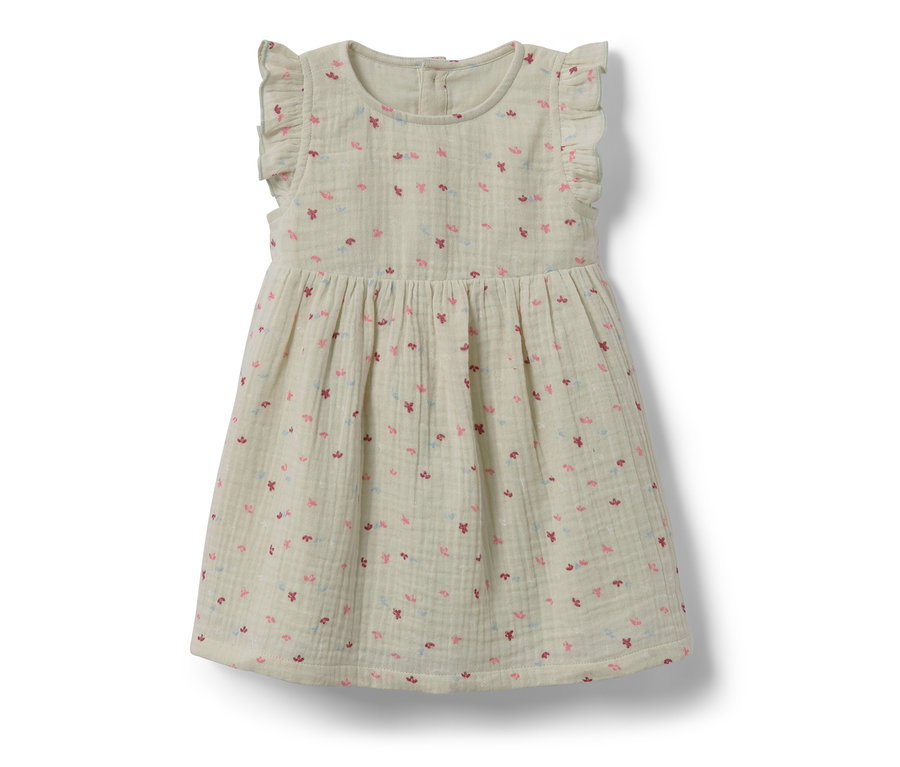 Robe tissée pour bébé avec un motif floral.