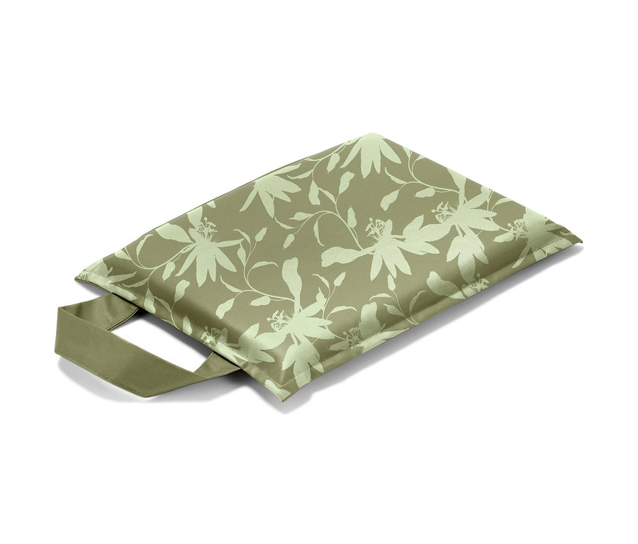 Coussin pour genoux avec motif de feuilles et de fleurs.