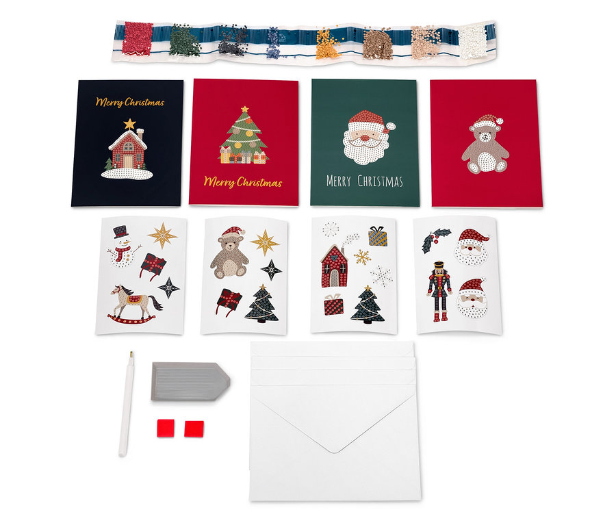 Ensemble de cartes de Noël avec enveloppes, un crayon et une gomme.