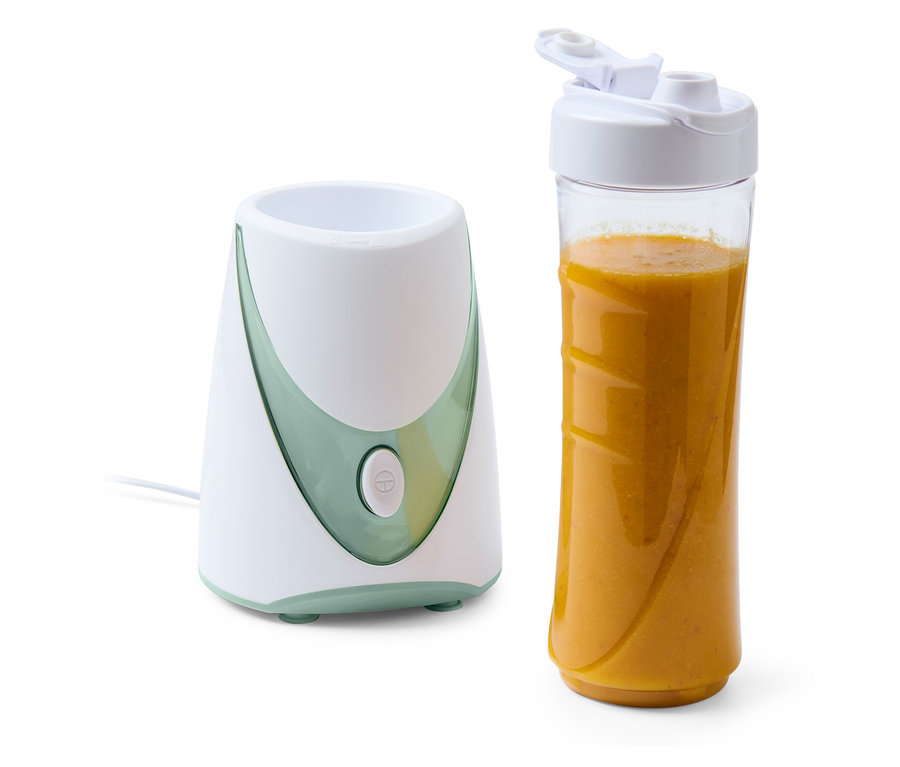 Machine à smoothies, 250 W, avec un récipient rempli de smoothie orange.