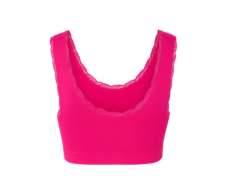 Une brassière sans coutures fuchsia avec de la dentelle.