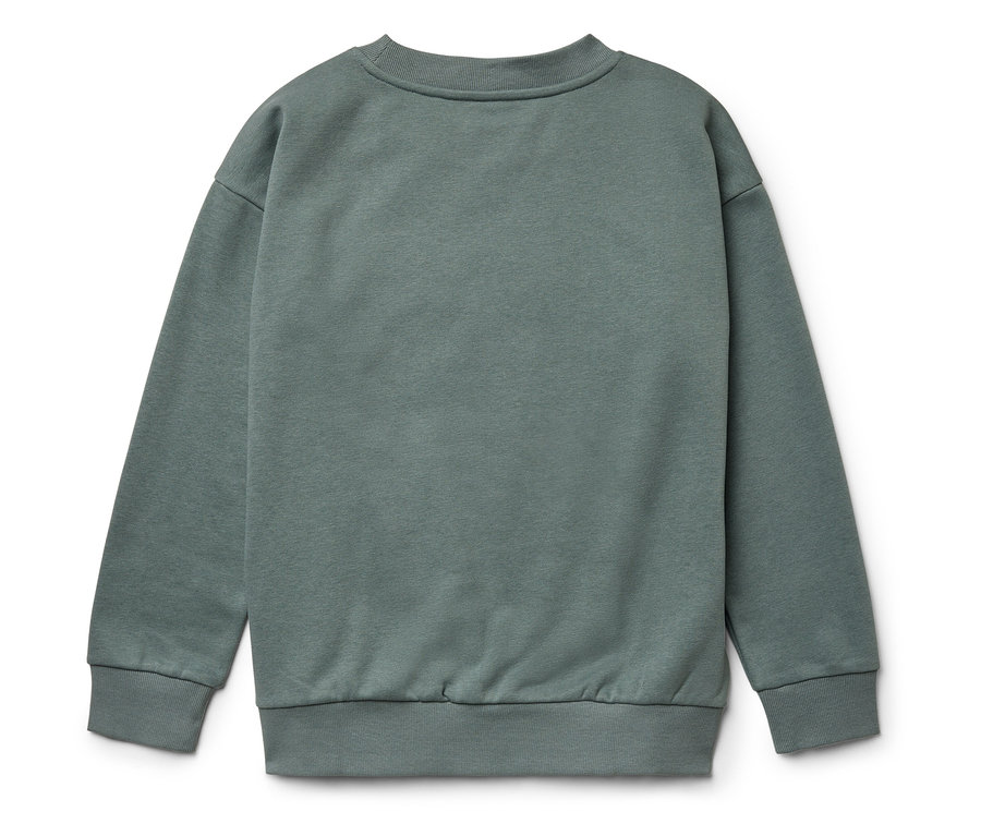Gros plan d'un sweat-shirt bleu-vert sur fond blanc.
