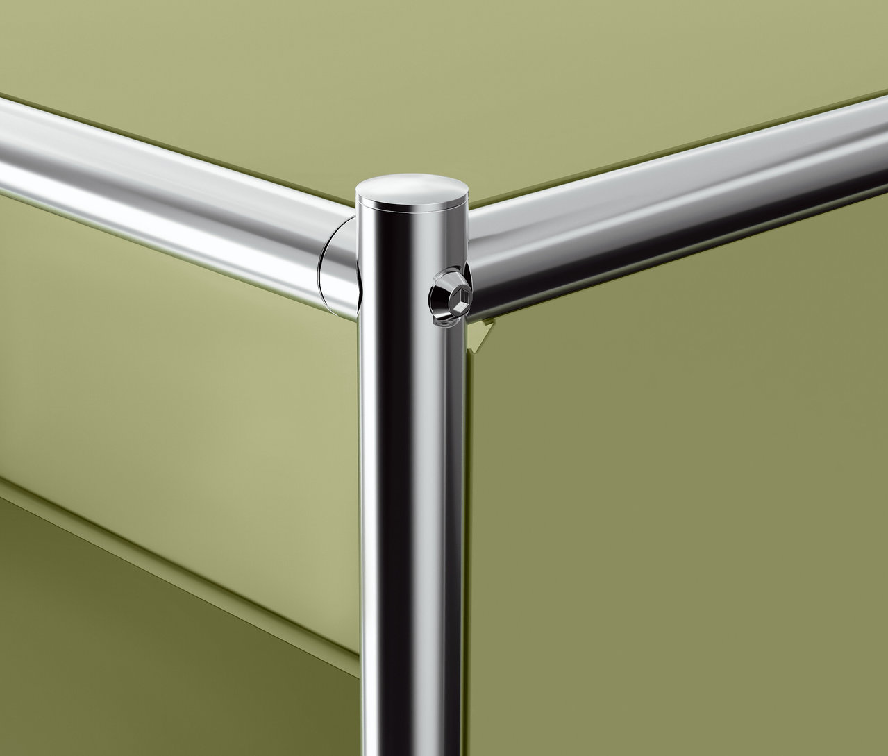 Détail d'un coin d'étagère métallique avec des tiroirs vert olive.