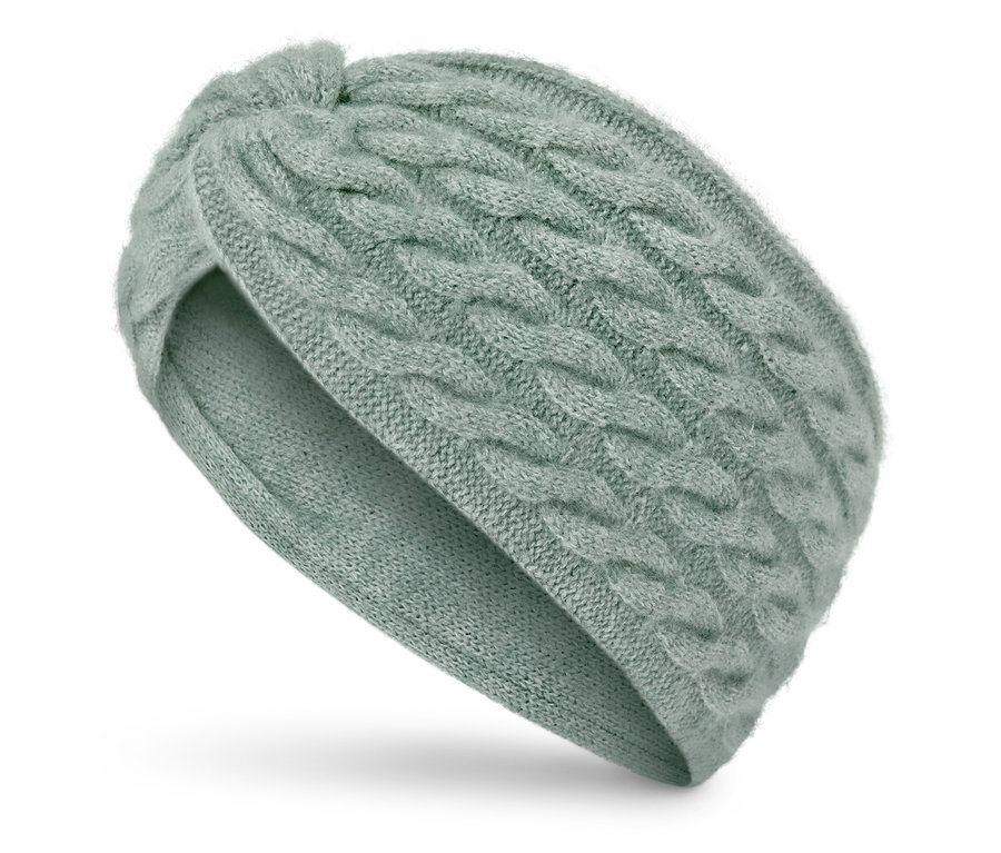Bandeau tricoté vert clair avec un nœud.