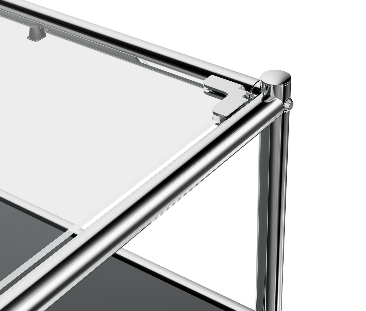 Détail du meuble bas en métal gris «
CN3
» avec abattant et plateau de verre.