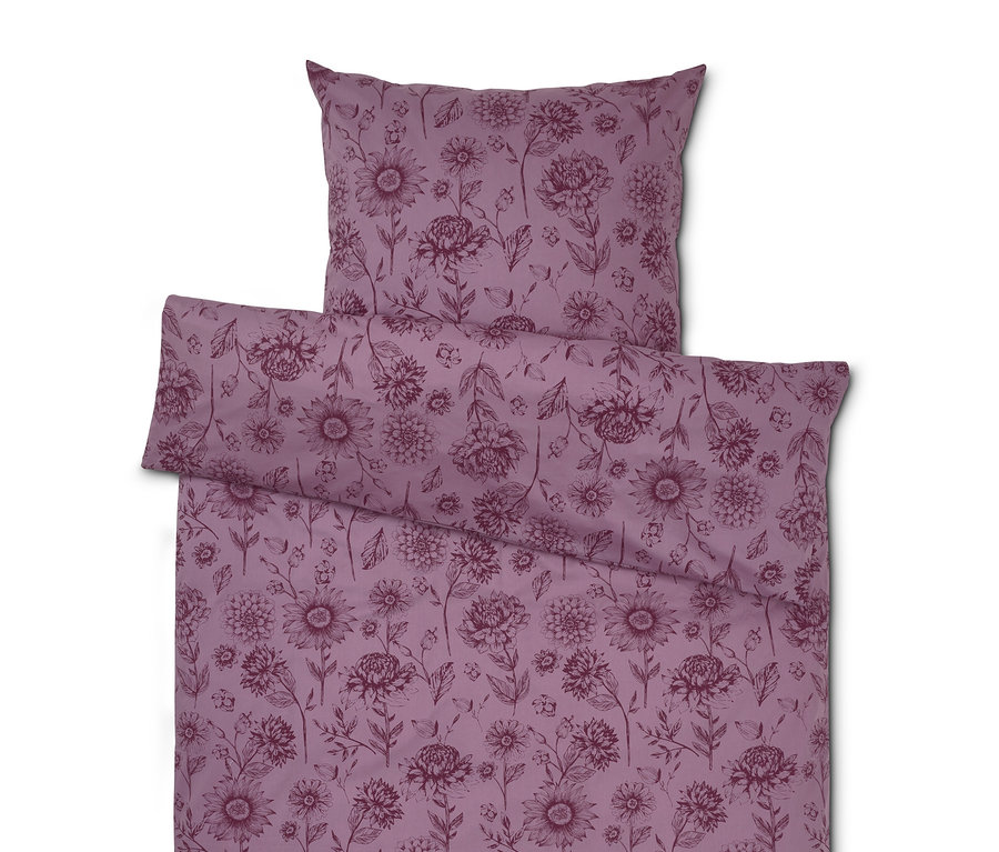 Linge de lit violet avec motif floral.