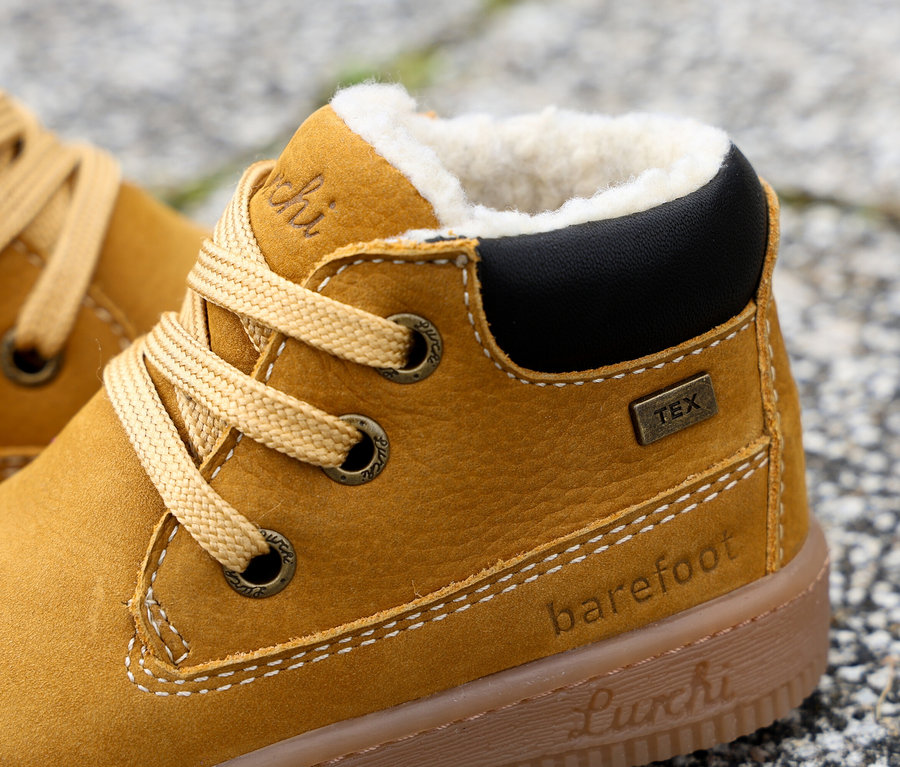 Gros plan d'une chaussure pieds nus pour enfant LURCHI « Fleximo Barefoot-TEX ».