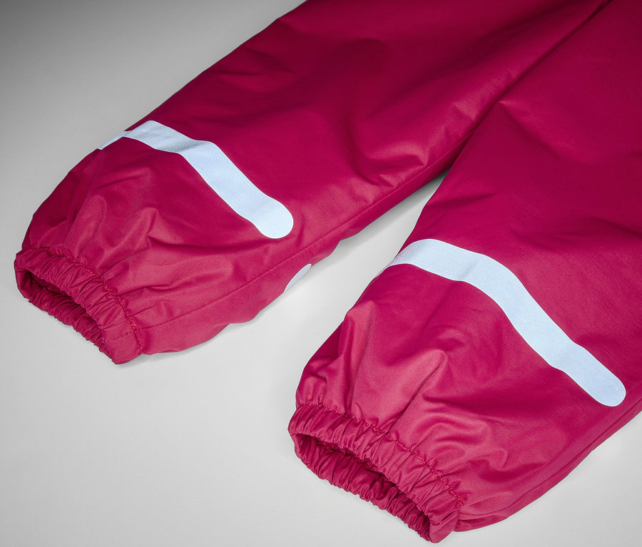 Détail du pantalon de pluie thermique pour enfant, baie.
